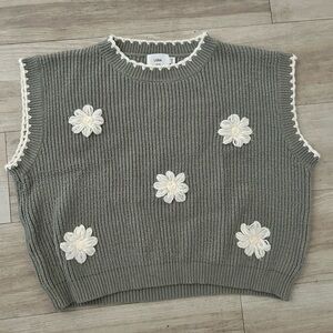Sleeveless Sweater with Floral Accents